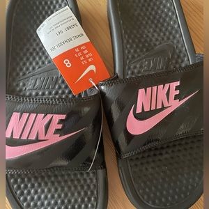 Black Nike slides